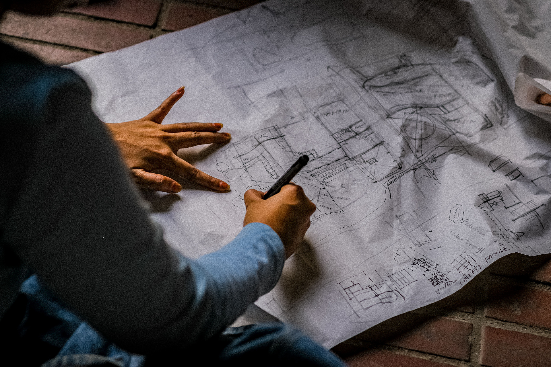 Architect sketching a floor plan